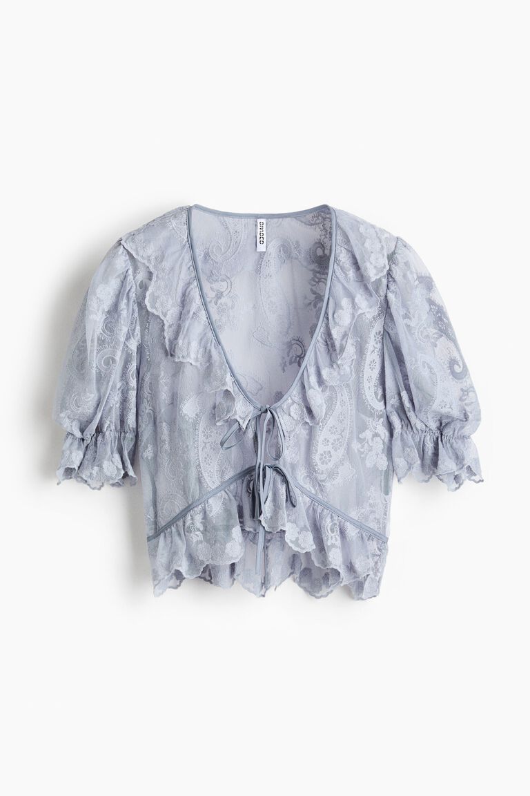 Embroidered flounced blouse