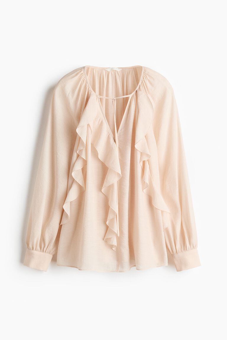 Flounce-trimmed blouse