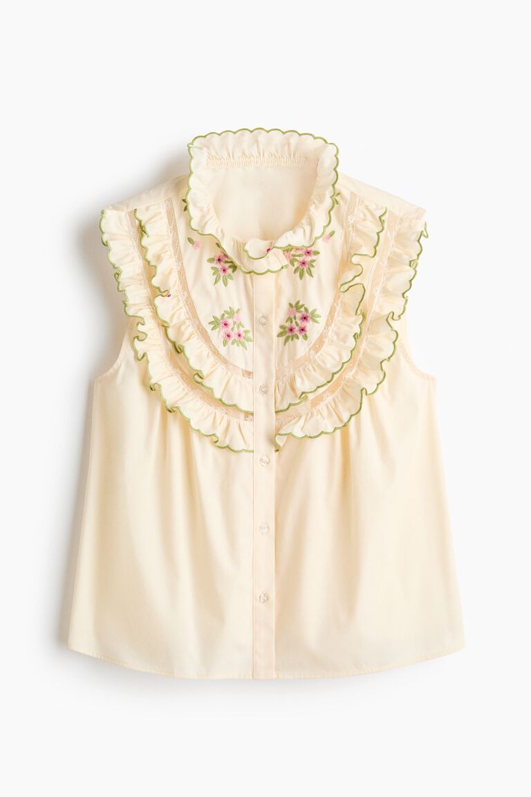Embroidered frill-trimmed top