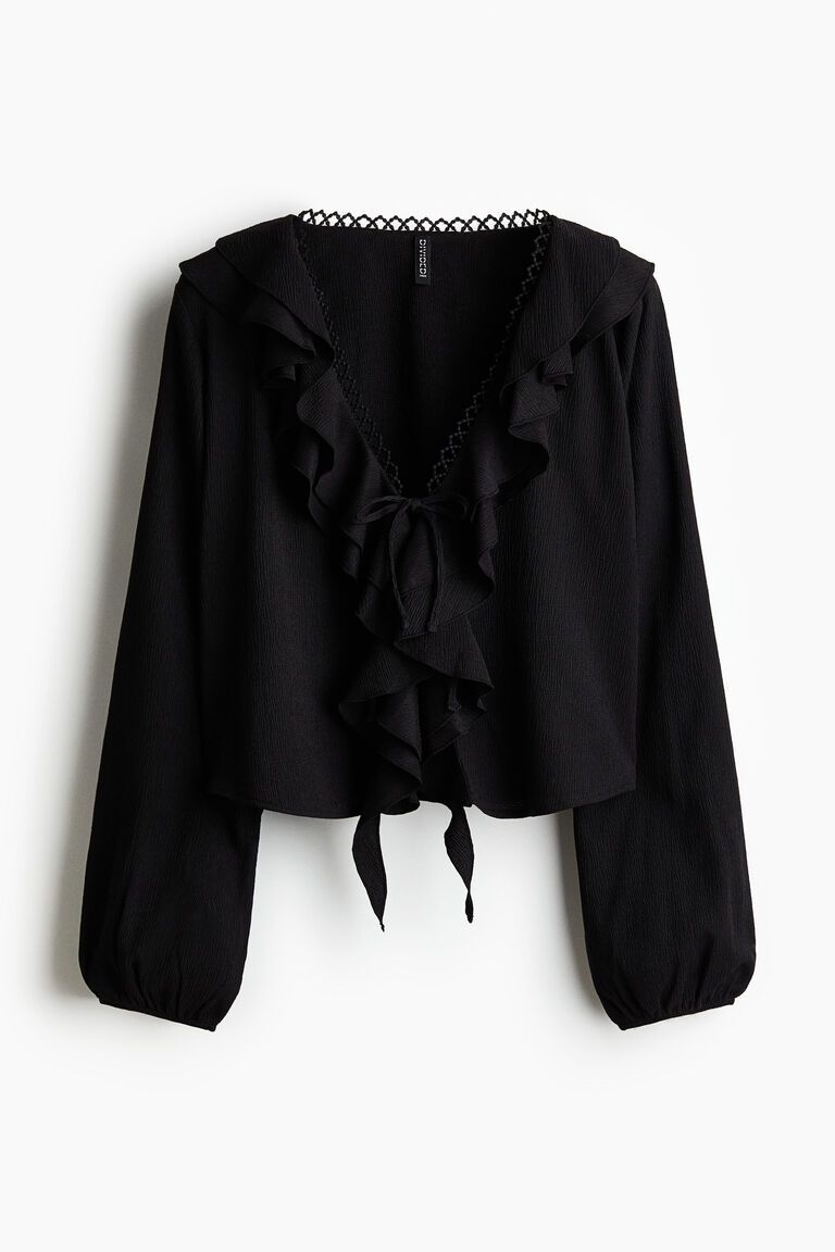 Flounce-trimmed blouse