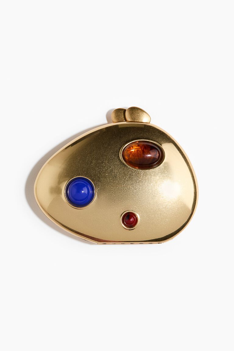 Asymmetric metal clutch