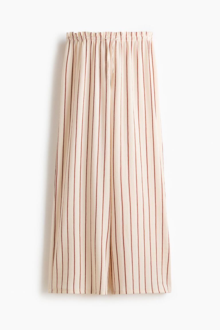 Crinkled paper bag trousers