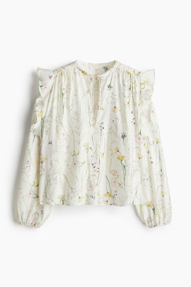 Flounce-trimmed blouse