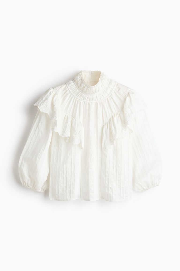Flounce-trimmed blouse