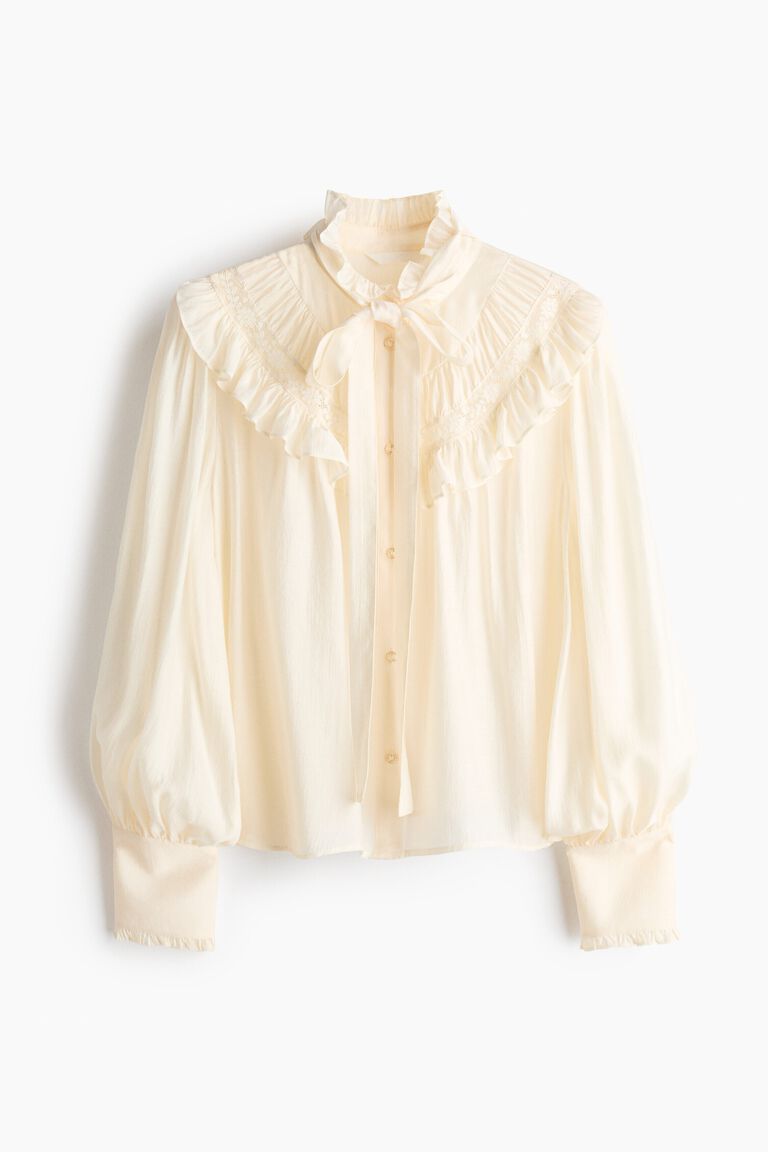 Frill-trimmed tie-neck blouse