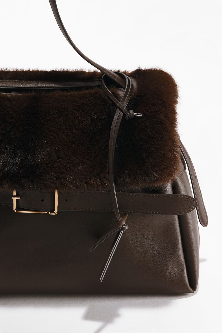 Strap-detail handbag